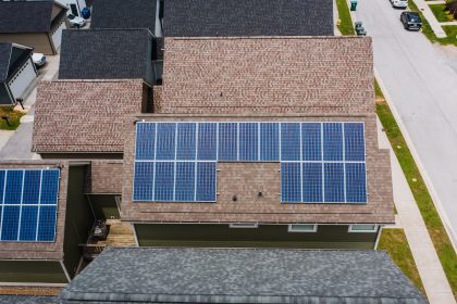 Solar Panels on Tiled Roofs of a House