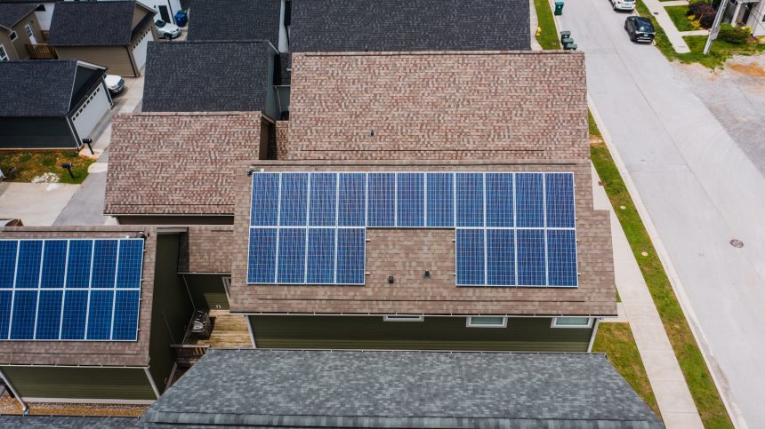 Solar Panels on Tiled Roofs of a House