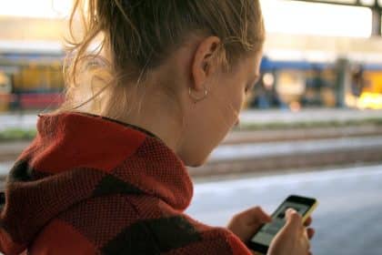 woman holding phone