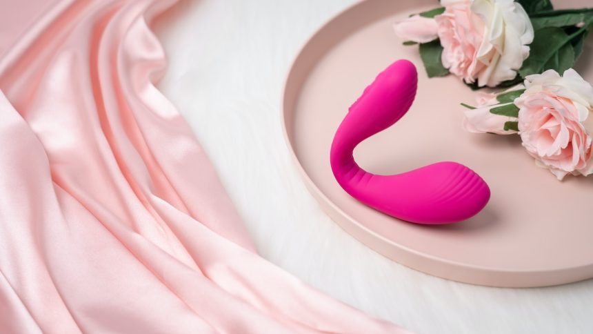 a pink object sitting on top of a pink plate